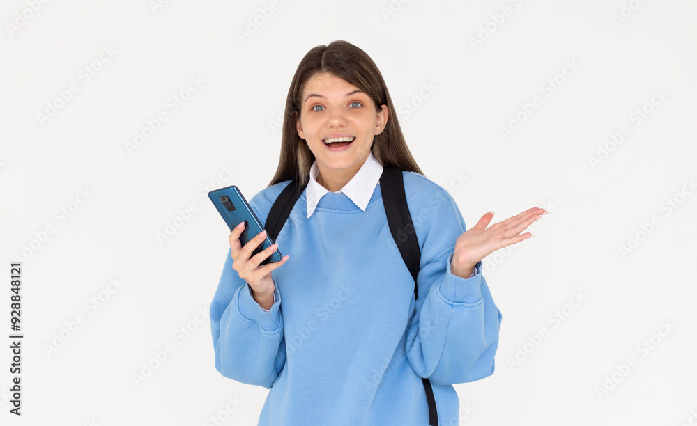 Extremely happy as a winner young woman celebrating victory in bets online casino lottery with money fortune using smart phone cellphone isolated in white background Extremely happy as a winner young woman celebrating victory in bets online casino lottery with money fortune using smart phone cellphone isolated in white background
