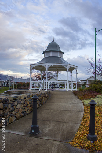 This photograph features a charming white wooden gazebo with grey roof at Central Park Bowral Southern Highlands New South Wales Australia photo