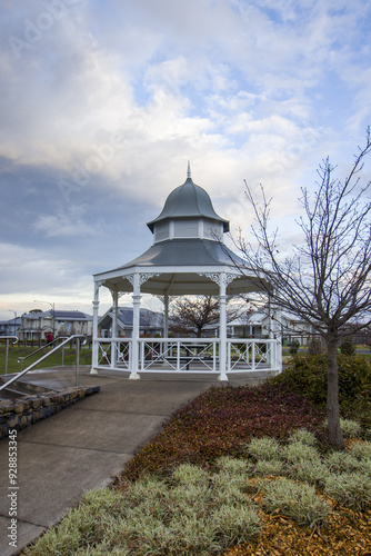This photograph features a charming white wooden gazebo with grey roof at Central Park Bowral Southern Highlands New South Wales Australia