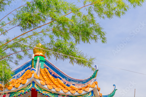 Wat Phra Si Rattana Mahathat Woramahawihan-Phitsanulok: August 9, 2024, Tourists, families with young children, making merit by giving alms in the morning, Mueang District, Thailand photo