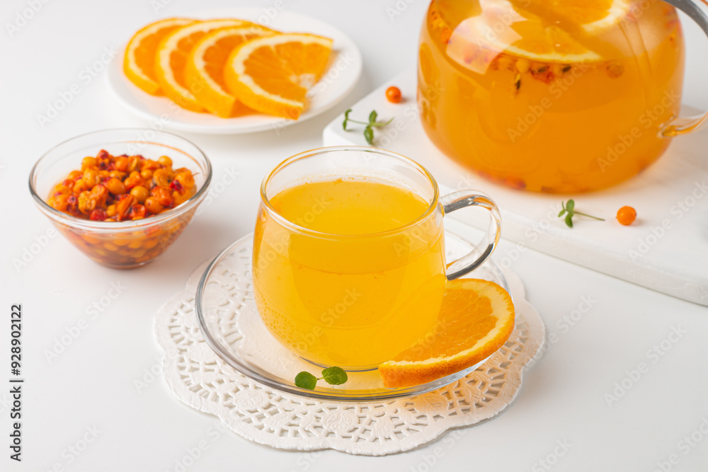 Sea buckthorn tea drink with oranges and mint. Autumn comfort hot drink. Herbal vitamin tea. Sea buckthorn tea drink with oranges and mint. Autumn comfort hot drink. Herbal vitamin tea.