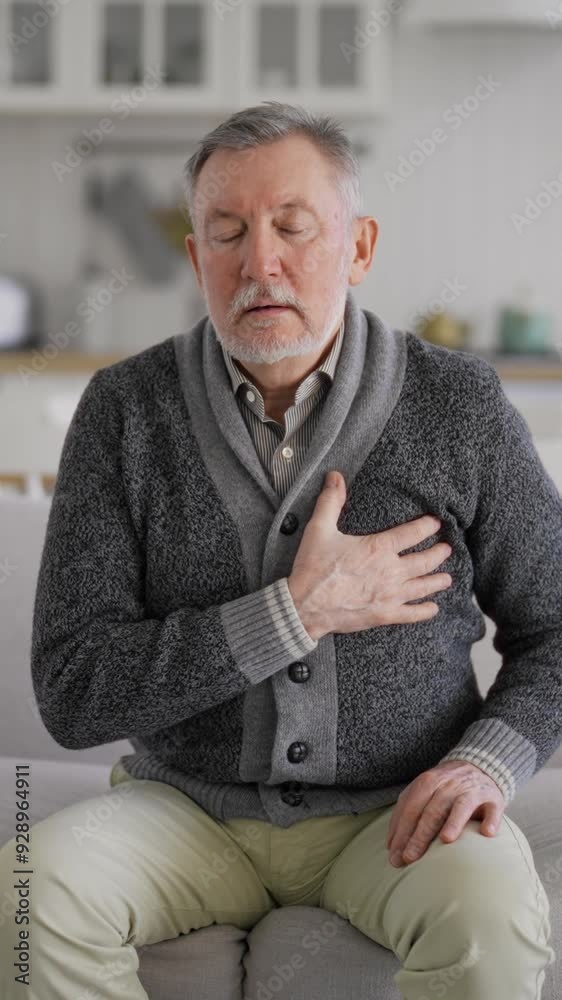 Heart attack of aged male person, portrait of old man feeling sharp pain in upper quadrant, vertical video. Sick senior man grabbing chest, screaming loudly, dangerous health conditions, healthcare Heart attack of aged male person, portrait of old man feeling sharp pain in upper quadrant, vertical video. Sick senior man grabbing chest, screaming loudly, dangerous health conditions, healthcare
