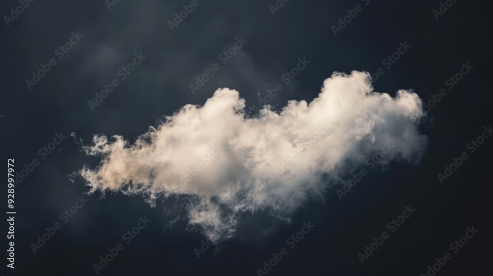 A fluffy, white cloud drifts in front of a dark, moody sky, evoking a sense of solitude and introspection. A fluffy, white cloud drifts in front of a dark, moody sky, evoking a sense of solitude and introspection.