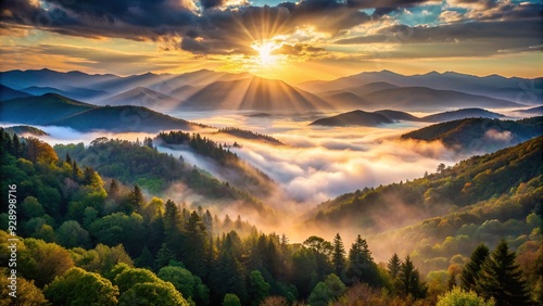 Majestic misty dawn breaks over the rolling hills and forested valleys of Smoky Mountain National Park in Tennessee, USA, with sunbeams filtering through fog.