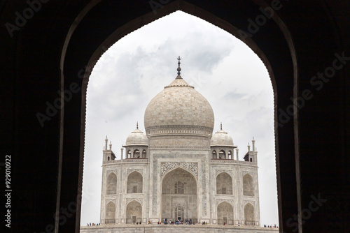 Taj mahal is a white marble mausoleum on the bank of the yamuna river in agra city, uttar pradesh state, India photo