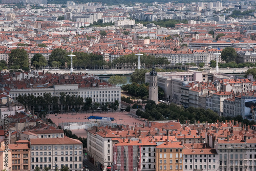 Lyon, France - 13th July, 2023: Attractions of the country. View of the city from viewpoint of Basilica of Notre Dame of Fourviere on sunny summer day. photo