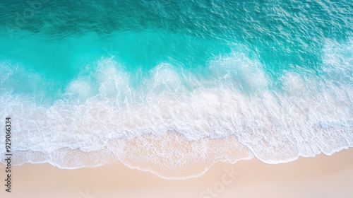 Turquoise Ocean Waves Crashing on White Sandy Beach