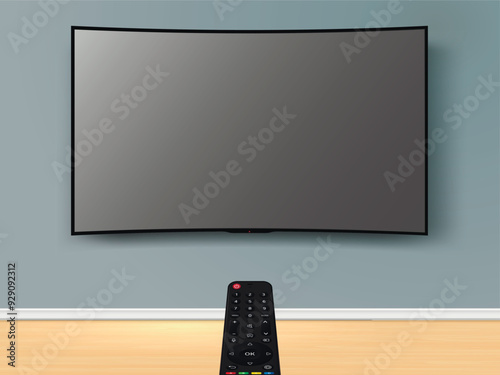 Watching online curved TV with remote control. Remote control is pointed at the TV on the wall.