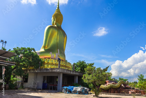 Background of religious tourist attraction, Wat Pa Dong Noi, in Noen Maprang District, Phitsanulok, Thailand, has a large Buddha statue for tourists to stop and make merit during their journey. photo