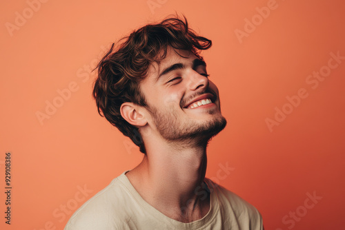 A close up of a man's face with his eyes closed