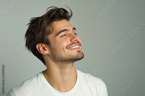 A close up of a man's face with his eyes closed