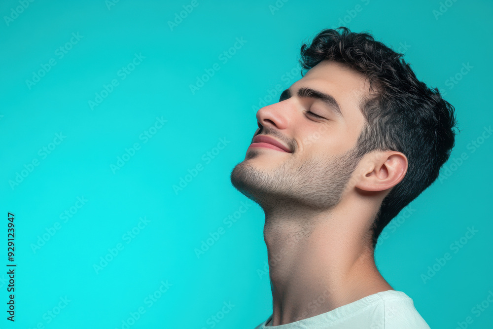 A close up of a man's face with his eyes closed
