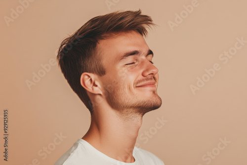 A close up of a man's face with his eyes closed