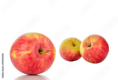 Several red apples, macro, isolated on white background.