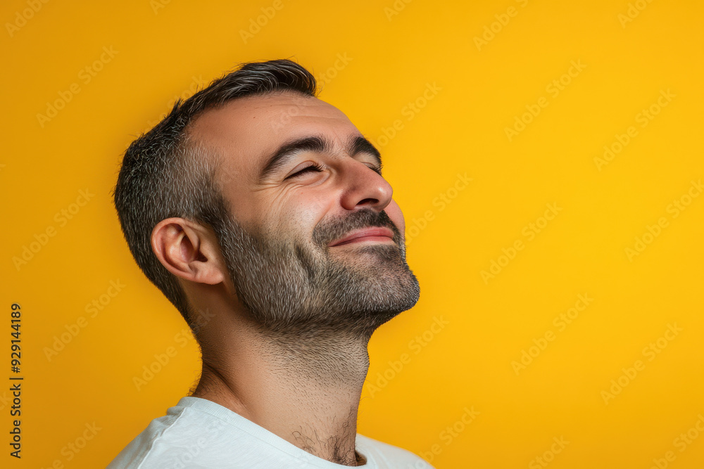 A close up of a man's face with his eyes closed A close up of a man's face with his eyes closed