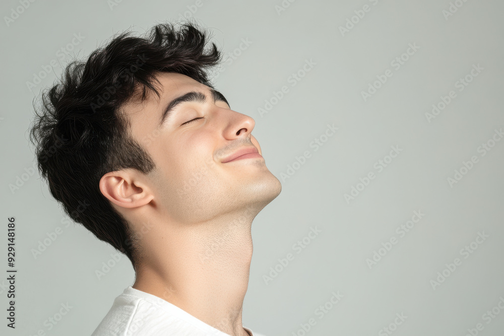 A close up of a man's face with his eyes closed A close up of a man's face with his eyes closed