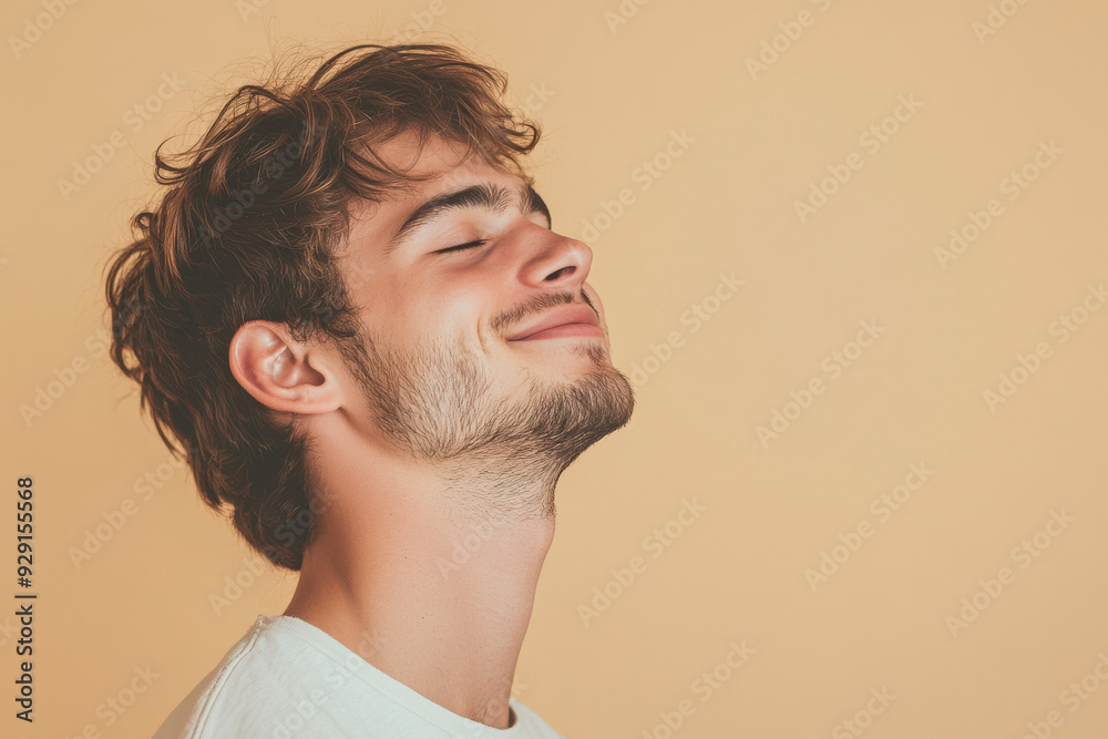 Obraz premium A close up of a man's face with his eyes closed