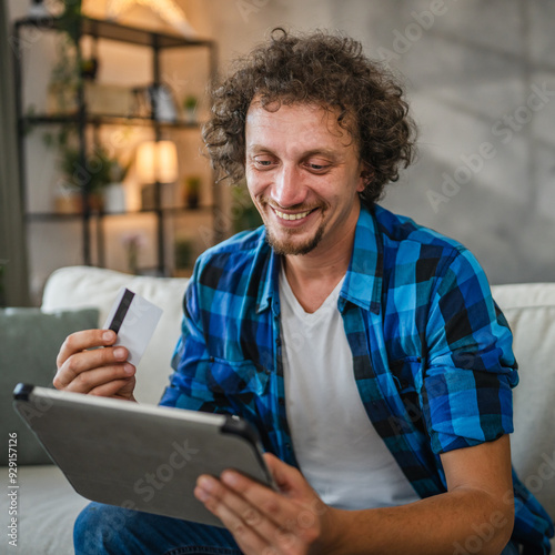 adult man have online shopping on digital tablet with credit card