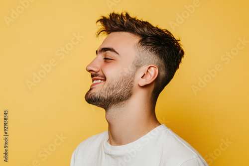 A close up of a man's face with his eyes closed