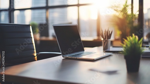 Modern Workspace: A Minimalist Desk with Laptop and Sunlit View