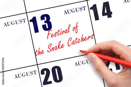 August 13. Hand writing text Festival of the Snake Catchers on calendar date. Save the date. photo