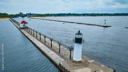 Aerial View of Dual Lighthouses on Pier Over Lake Michigan photo