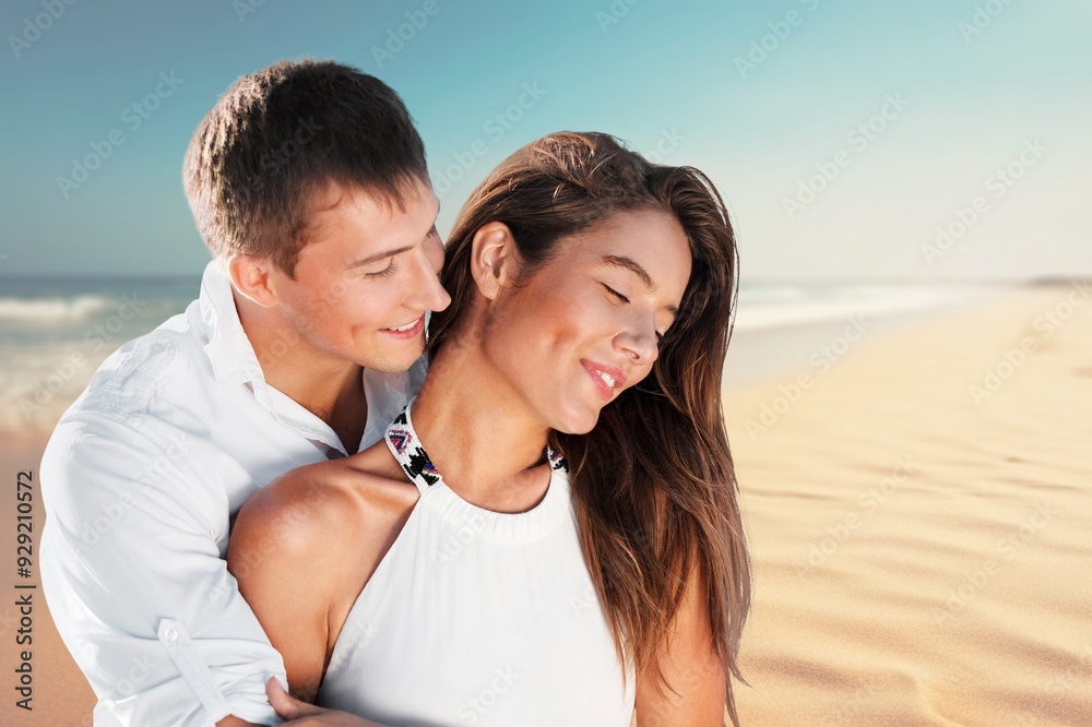 Happy young lovely couple at beach vacation Happy young lovely couple at beach vacation