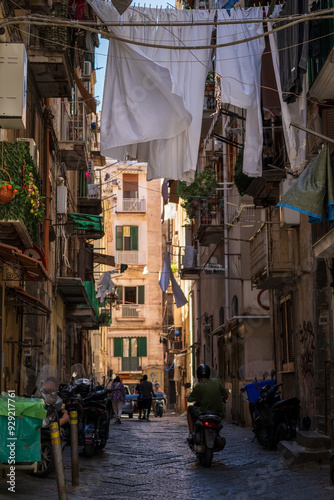 Obraz na płótnie Laundry hanging out of a typical street of Naples in summer w salonie
