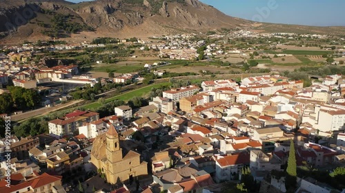Aerial 4K video from drone to city of Loja and Church of the Incarnation with Moorish Alcazaba and Gorda Peak at Loja ,Granada, Andalusia, Spain, Europe (Series)