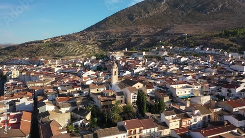 Aerial 4K video from drone to city of Loja and Church of the Incarnation with Moorish Alcazaba and Gorda Peak at Loja ,Granada, Andalusia, Spain, Europe (Series)