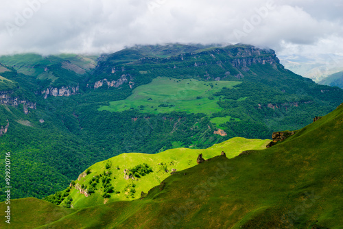 Picturesque dramatic view of the green mountains in cloudy weather. Caucasus photo