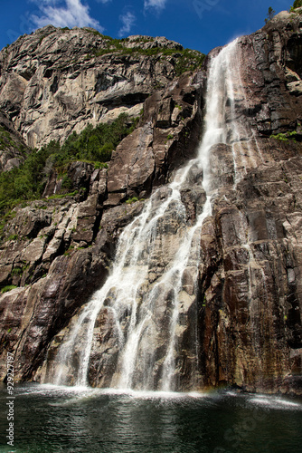 View of a small waterfall over the Lysefjord, a fjord in Norway.