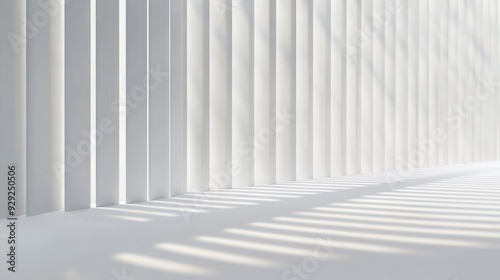 A minimalist interior with vertical white panels casting shadows on a light surface.