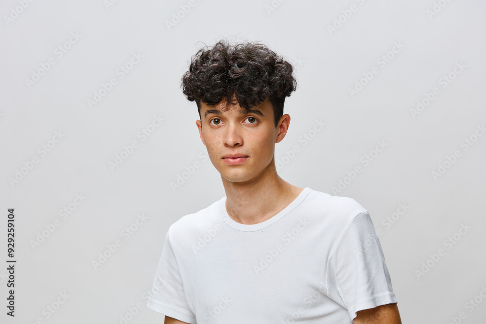 portrait, young man, casual attire, neutral background, modern style, fashionable appearance, confidence, natural lighting, relaxed expression, individuality, youthful vibe, shallow depth of field portrait, young man, casual attire, neutral background, modern style, fashionable appearance, confidence, natural lighting, relaxed expression, individuality, youthful vibe, shallow depth of field