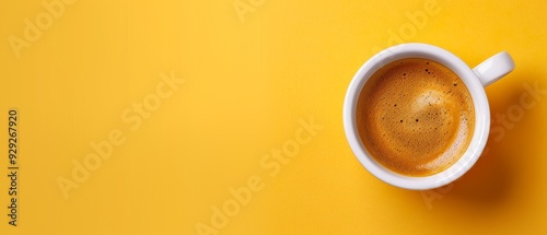  Two cups of coffee, each atop a distinct yellow table