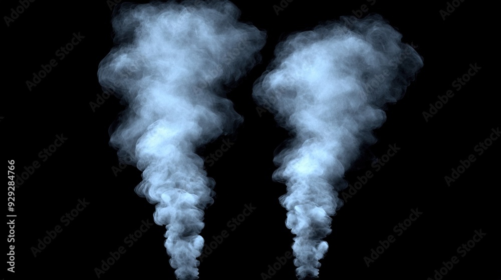   Two smokestacks on a black background
