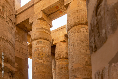 The breathtaking beauty of the Temple of Karnak, located in the heart of ancient Thebes. The immense hall flanked by towering columns, testimony to the architectural prowess of the ancient Egyptians. photo