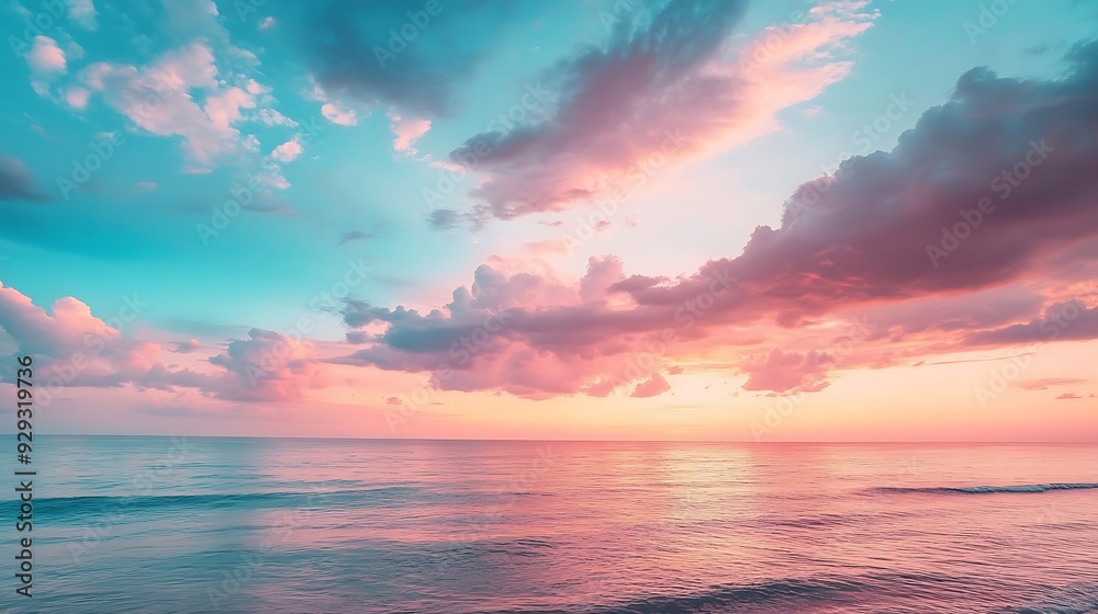 Beautiful pink and blue sunset sky over a calm ocean. Beautiful pink and blue sunset sky over a calm ocean.