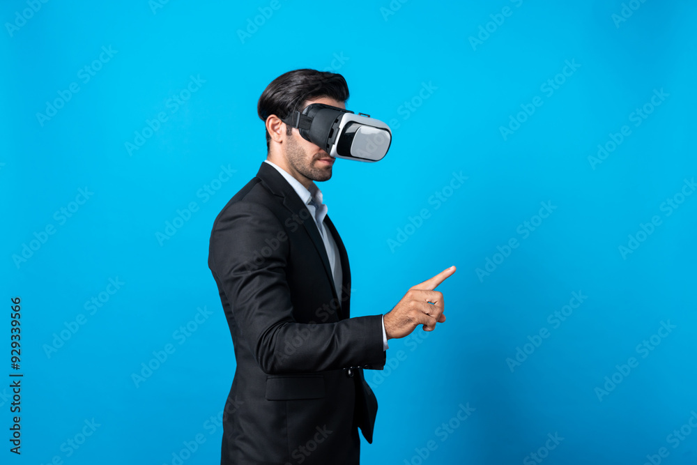 Project manager with virtual reality glasses looking at data analysis while analyzing and pointing data. Skilled business man using VR goggle and digital innovation while enter metaverse. Deviation. Project manager with virtual reality glasses looking at data analysis while analyzing and pointing data. Skilled business man using VR goggle and digital innovation while enter metaverse. Deviation.