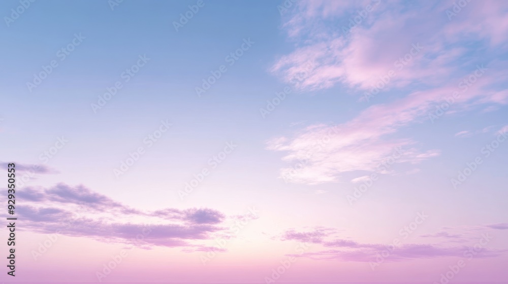 A serene sky at dusk with soft pink and blue hues. A serene sky at dusk with soft pink and blue hues.