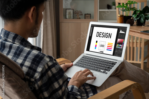 Graphic designer software for modern design of web page and commercial ads showing on the computer screen