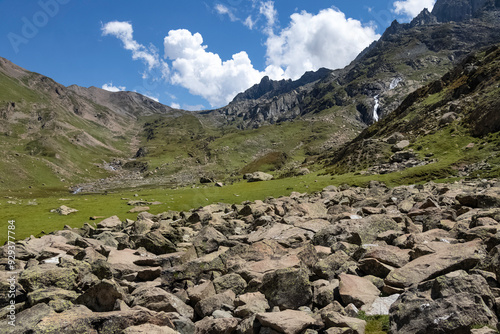 Beautiful mountain scenery. River, valley, snow, blue sky, white clouds. In-depth trip on the Sonamarg Hill Trek in Jammu and Kashmir, India photo