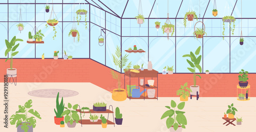 Indoor garden with green plants and equipment. Greenhouse interior