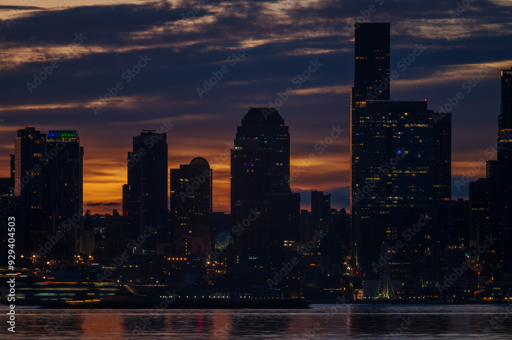 Fototapeta premium Seattle, Washington Skyline Just Before Sunrise. Beautiful morning looking at the cityscape across Elliott Bay in the Salish Sea area of western Washington state.