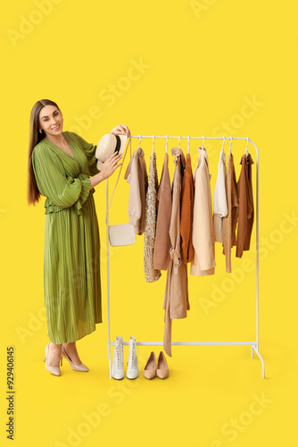 Happy female stylist with c...
