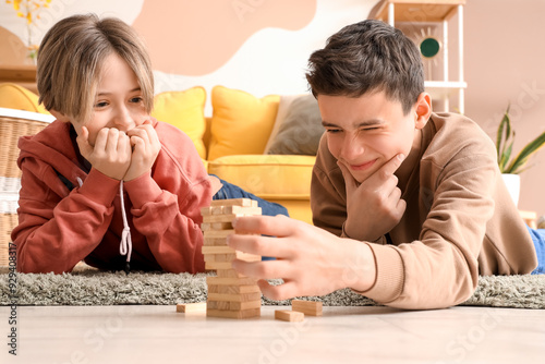 Happy brothers playing game...