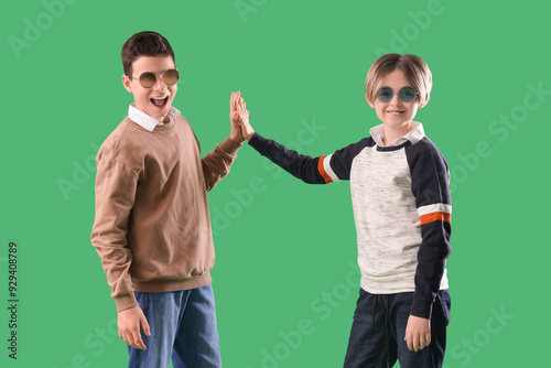 Happy brothers in sunglasse...