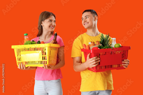 Young couple with full shop...