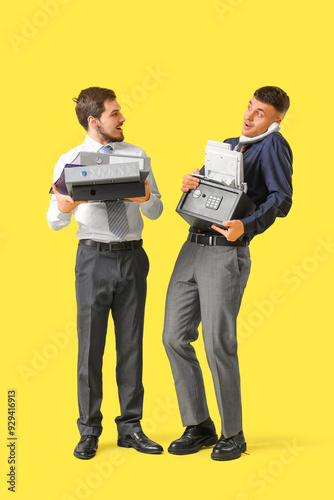 Shocked young men with safe...