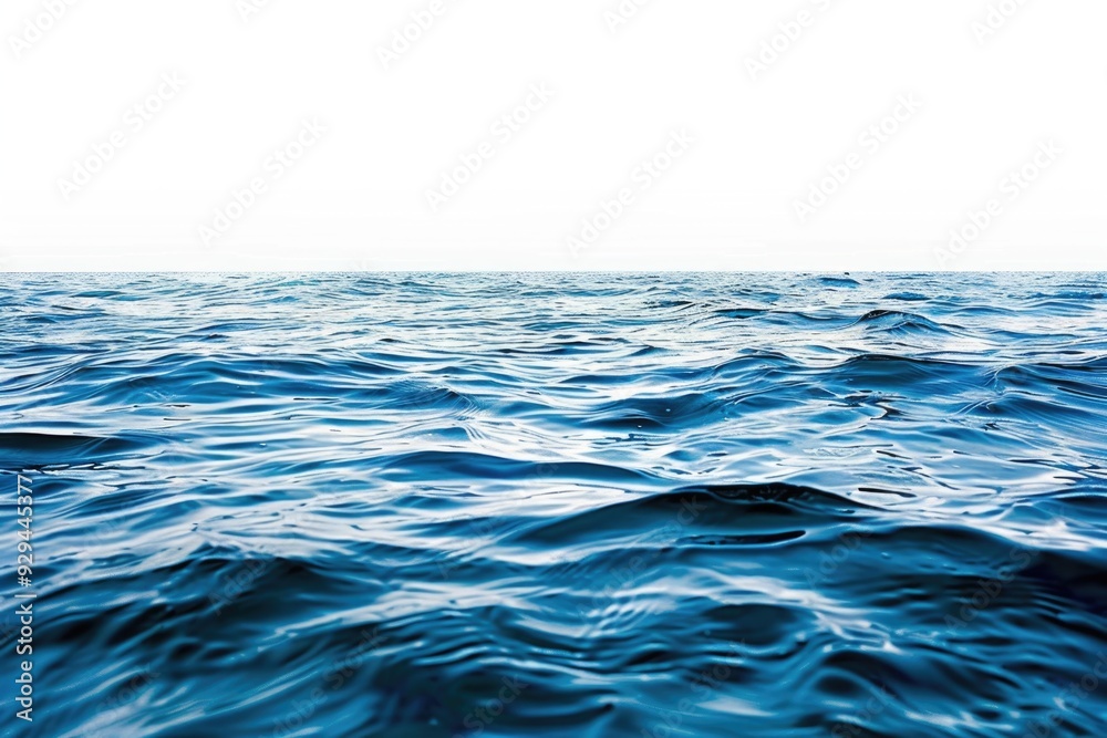 Naklejka premium A serene lakeside scene with a small boat visible in the distance, surrounded by lush greenery and calm waters